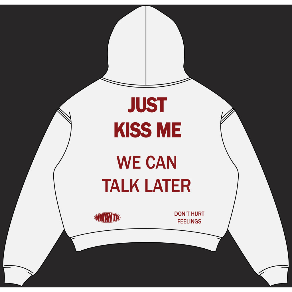 White NWAYTA Just Kiss Me oversized cropped hoodie back view with dark red quote design, padded on white square canvas